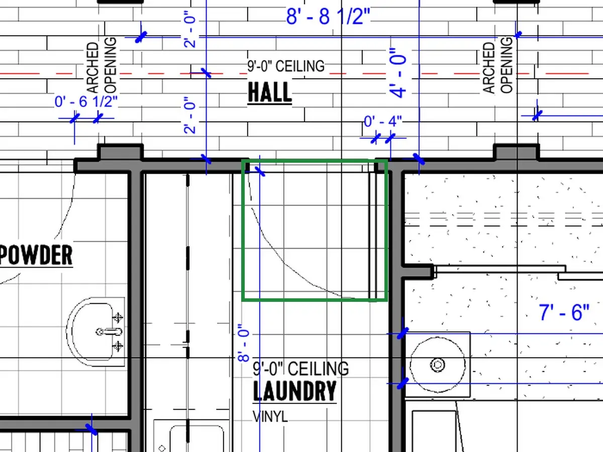 A2.1 · floor plan, boxed in green where it shows what belongs there: A2.1 swings it into the laundry, and 26 shows it standing open inside; from the hall no hinges show.